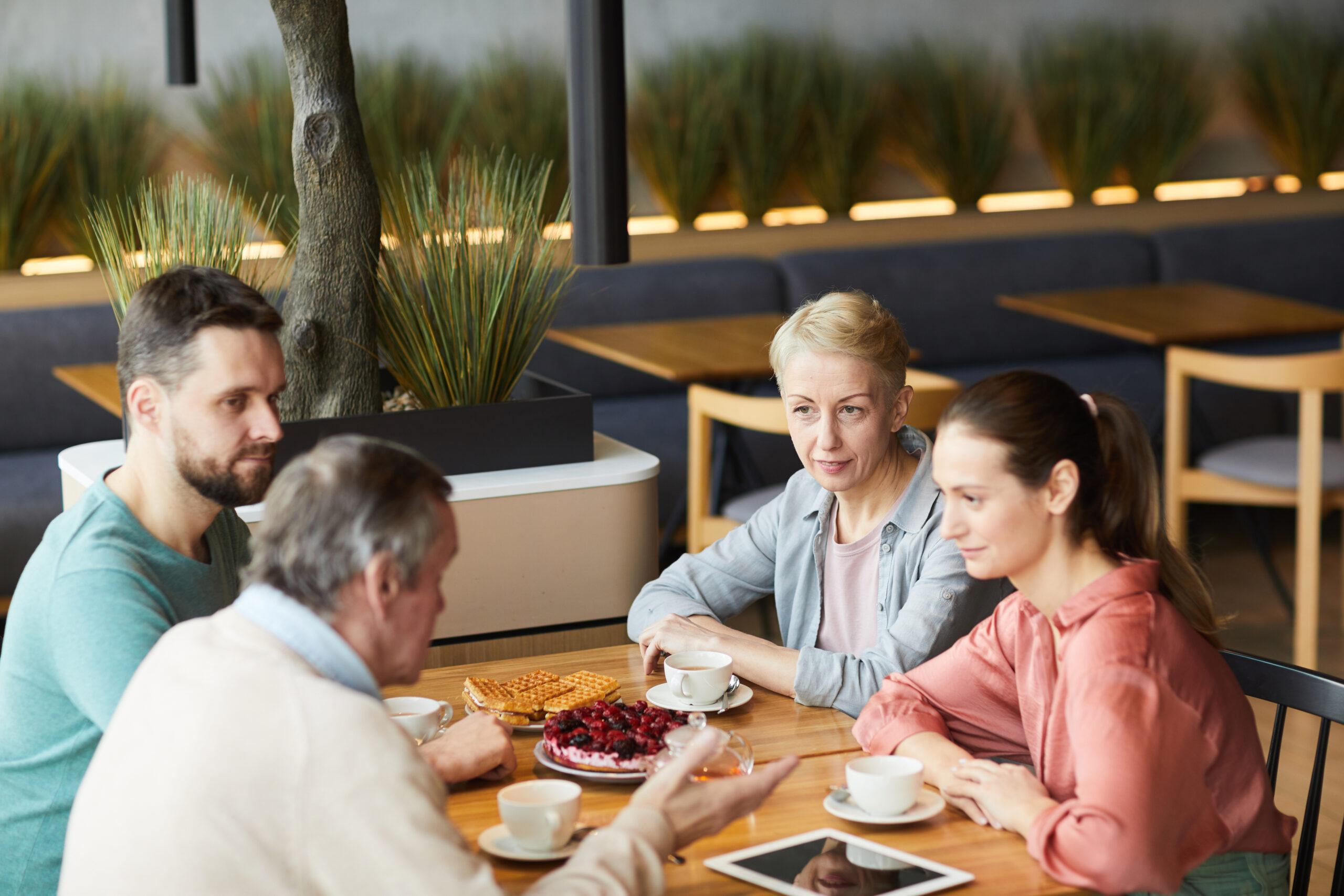 Family meeting in cafe